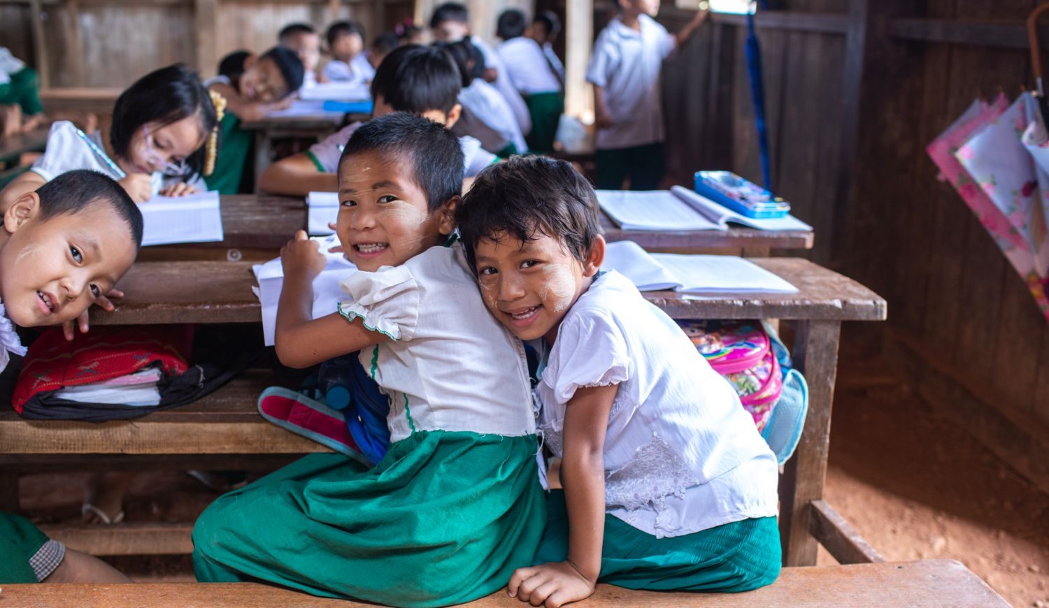 Children learning at a OneMindCharity center in Cox's Bazar