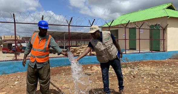 Community members working on water conservation project